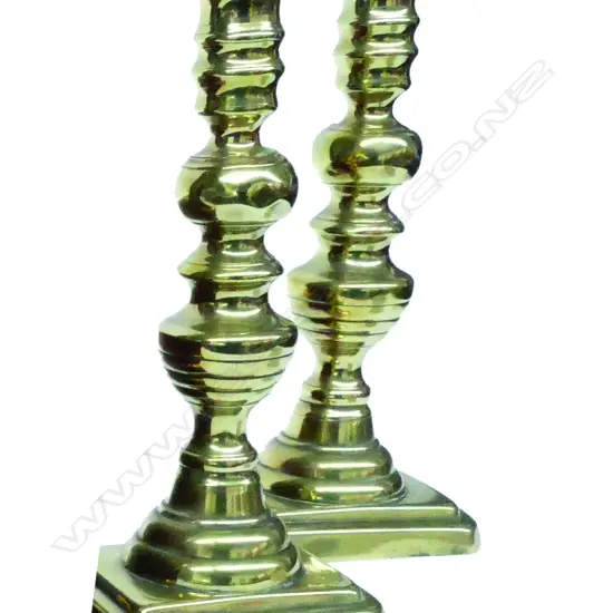 A pair of Victorian brass column ejector candlesticks