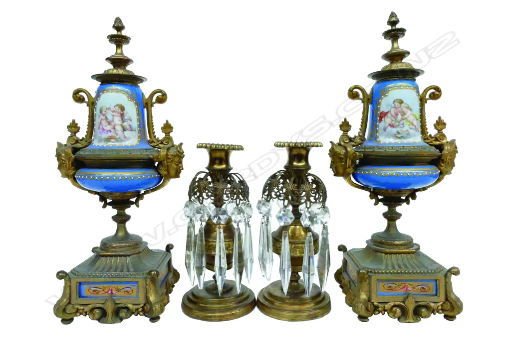 A pair of French mid-19thC gilt metal garniture castlettes with porcelain bodies in the manner of Sèvres Image 1++