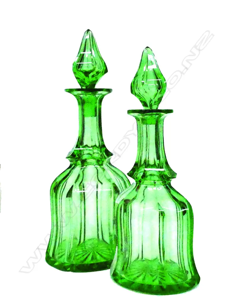 A pair of mid-Victorian faceted green glass large decanters Image 1++