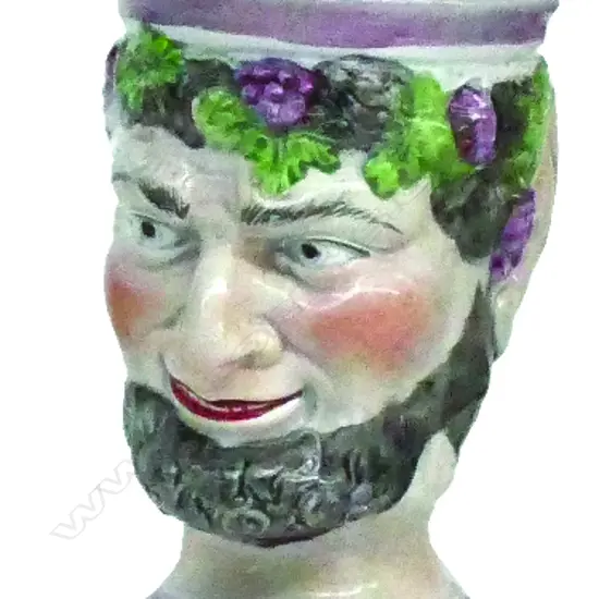 A rare 19thC Staffordshire Bacchus mask jug