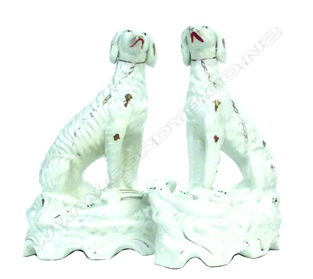 A pair of Victorian Staffordshire seated wolfhound figures Image 1++