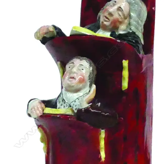 An early 19thC Sir Izaac Walton Staffordshire pulpit figure group 'Vicar and Moses'