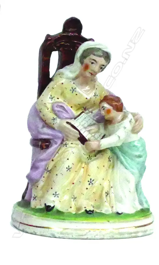 A Victorian Staffordshire figure group 'The Reading Lesson' Image 1++