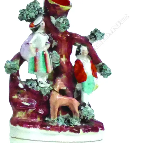 A Victorian Staffordshire figured spill vase