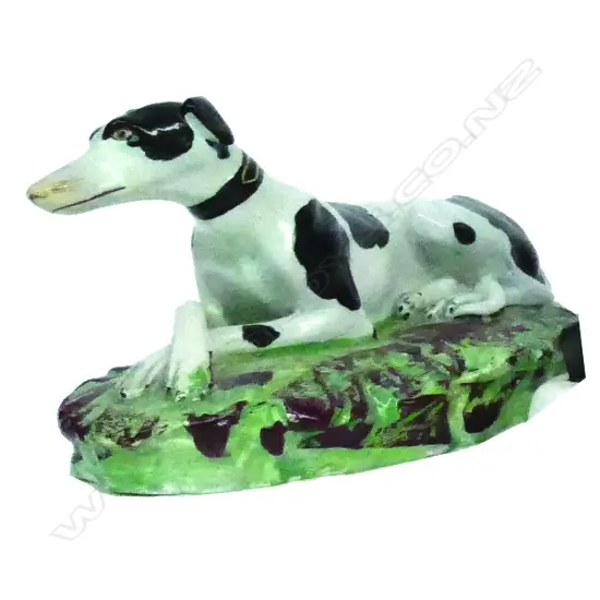 A Victorian Staffordshire reclining hound