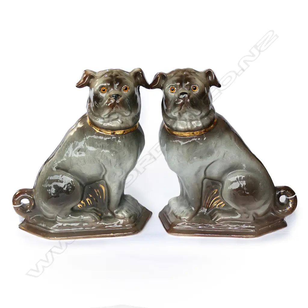 A pair of 19thC porcelain small pug dog ornaments Image 1++