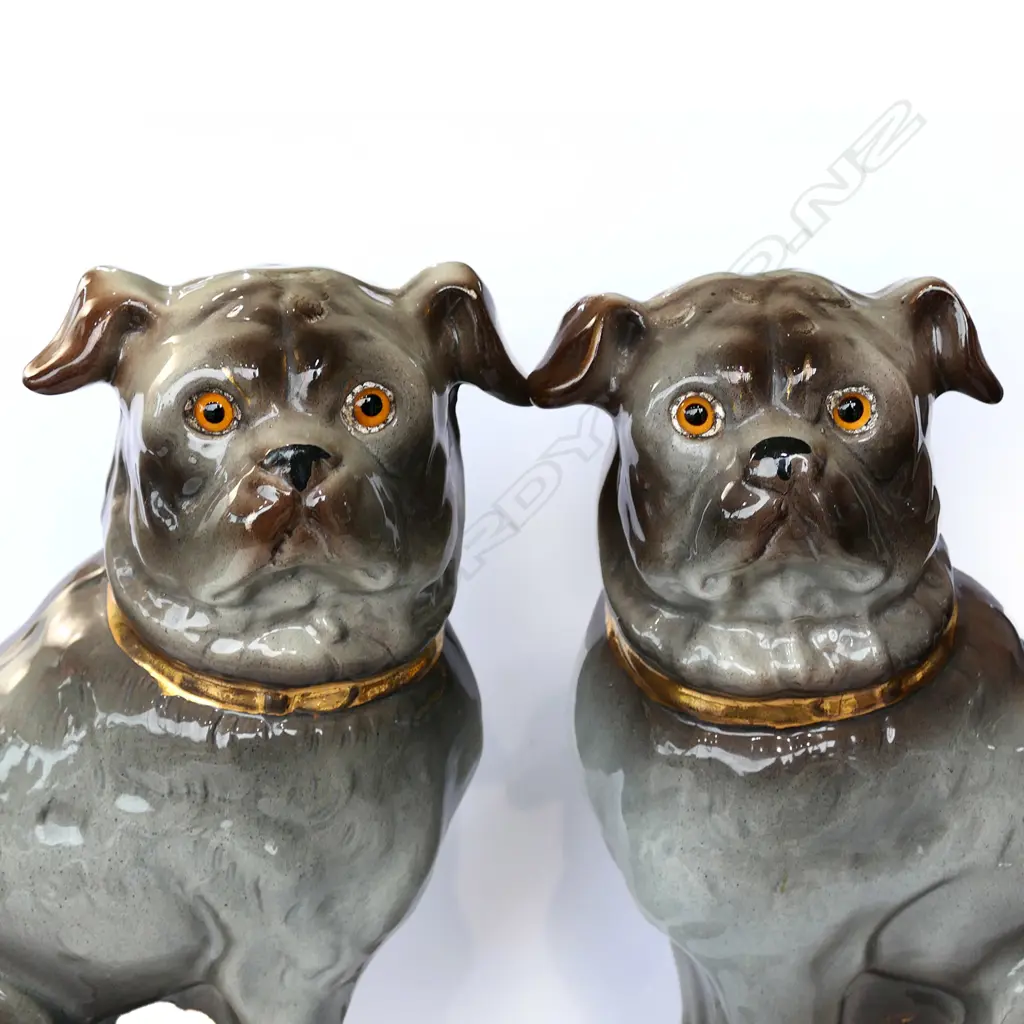 A pair of 19thC porcelain small pug dog ornaments Image 1++