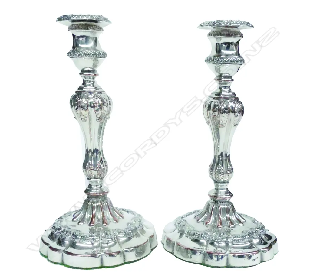 A pair of early 19thC Sheffield plated candlesticks Image 1++
