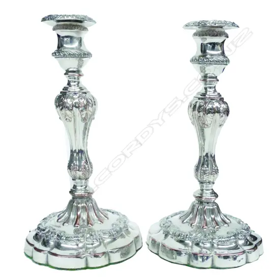 A pair of early 19thC Sheffield plated candlesticks