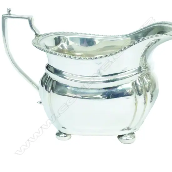 A Georgian Revival silver milk jug