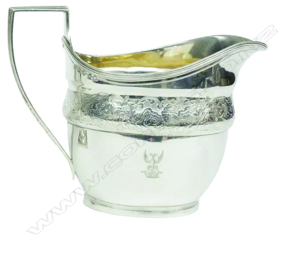 A Geo. III silver flat bottom cream jug Image 1++