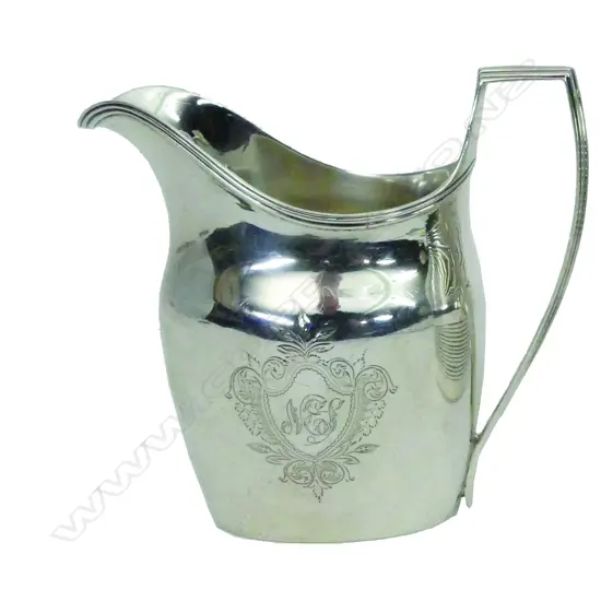 A George III silver flat bottom cream jug