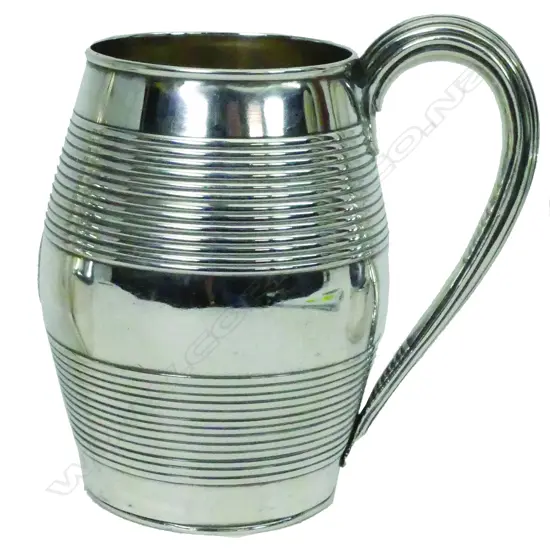 A George III silver barrel shaped mug