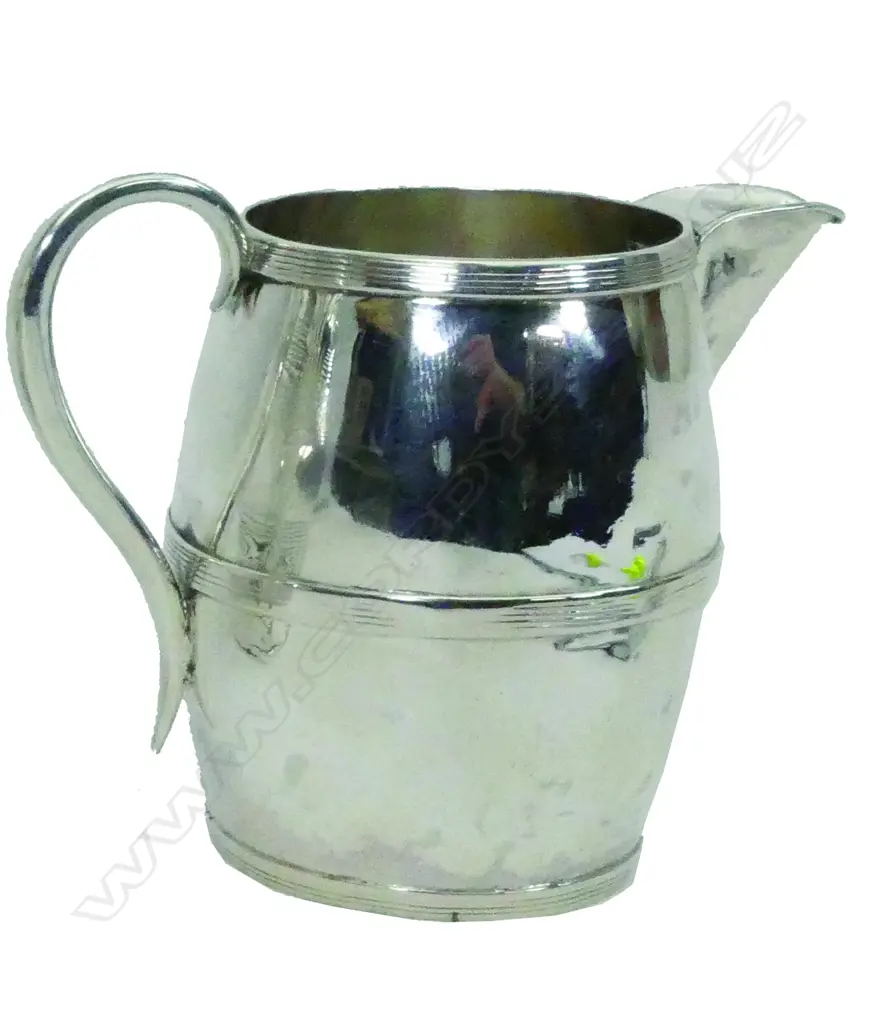 A late Georgian silver barrel shaped jug Image 1++