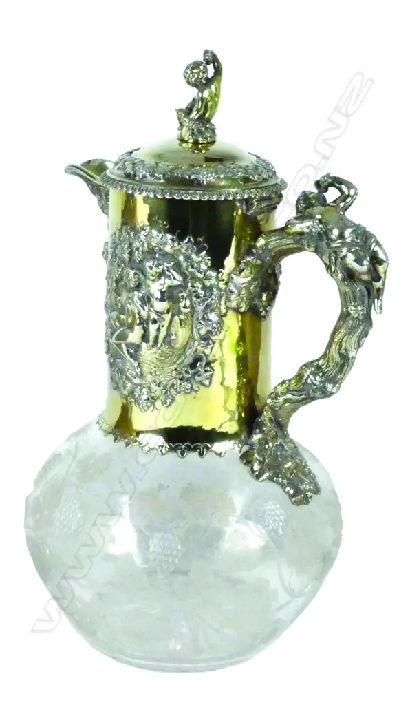 An impressive Victorian silver gilt and cut glass claret jug Image 1++