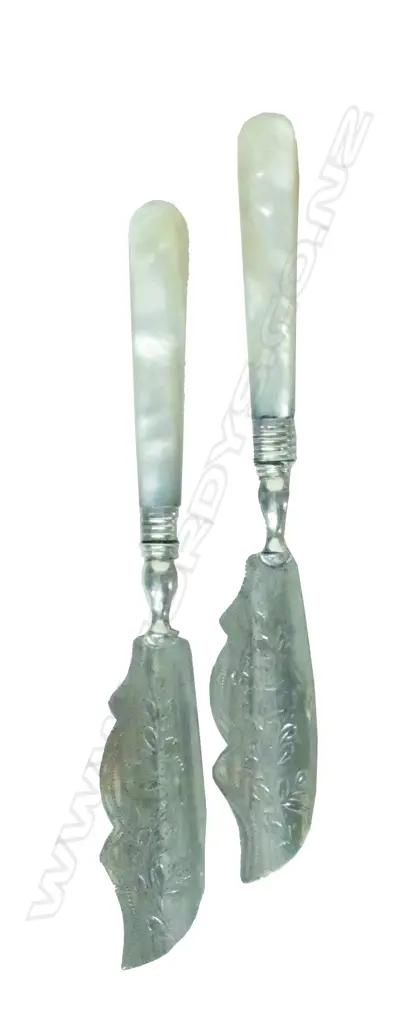 Two Victorian silver and mother of pearl butter knives Image 1++