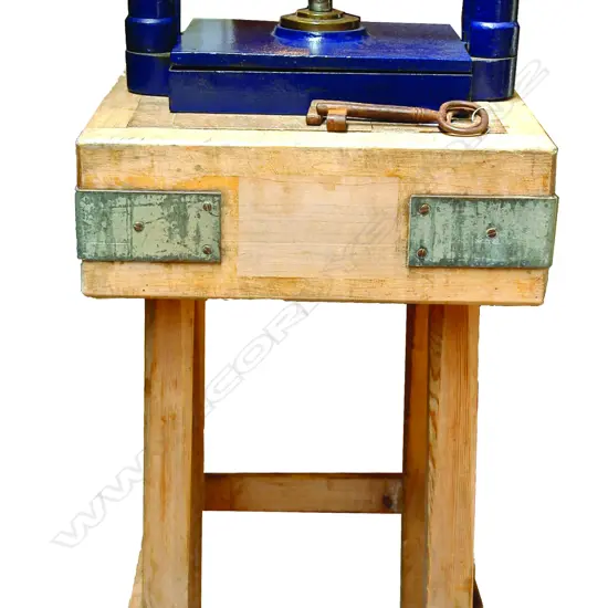 An Edwardian blue painted steel and brass book press