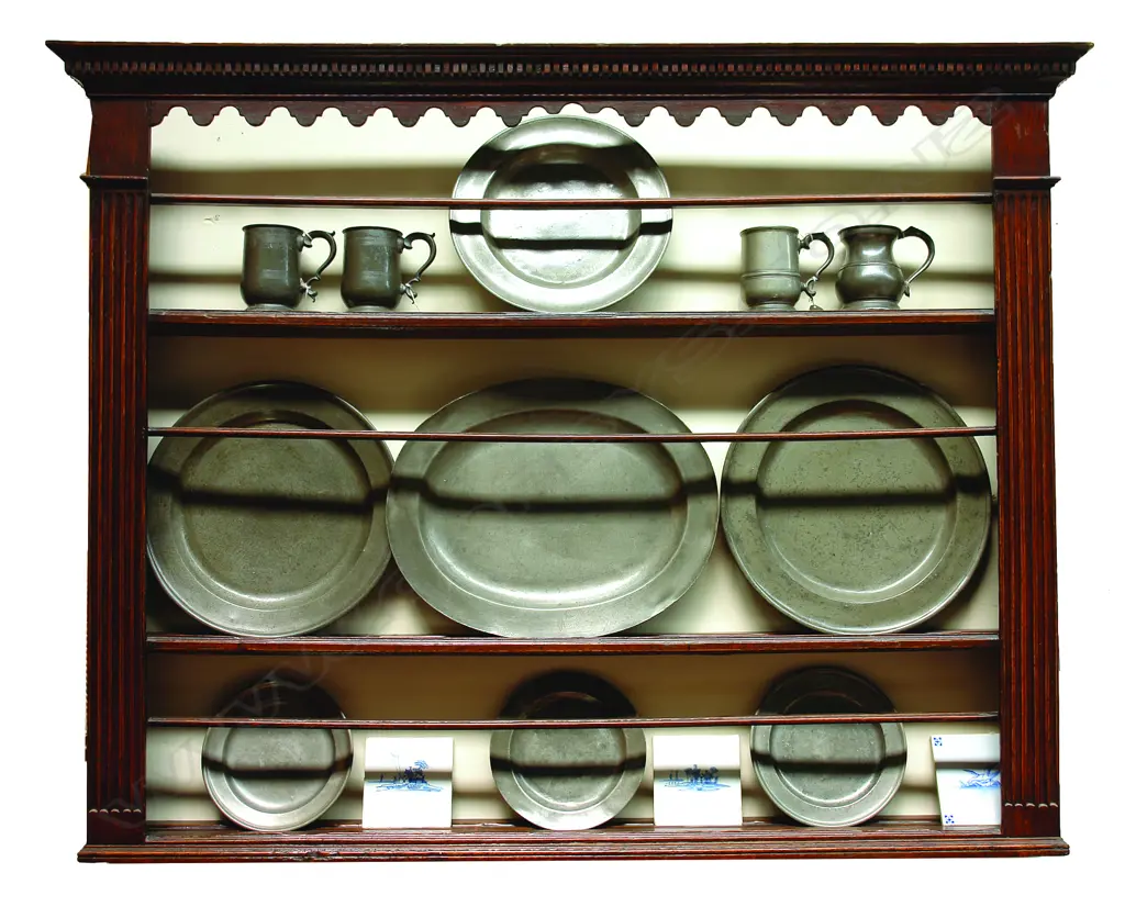 A Geo. III wall mounting pewter plate rack Image 1++