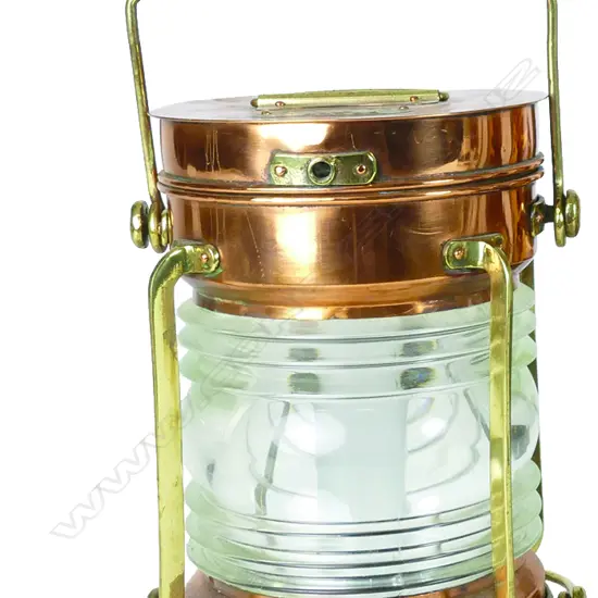 A vintage copper and brass navigation light
