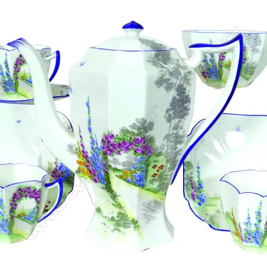 A Shelley china demitasse coffee set 'Archway of Roses' pattern No. 11606