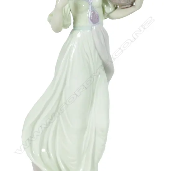 A Lladro porcelain figure 'Autumn Romance' modelled by Regino Torrijos