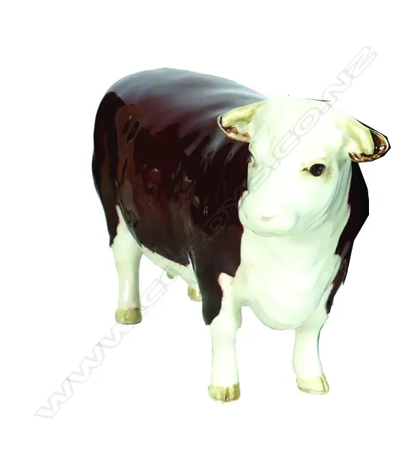 A Beswick model of a Hereford cow Image 1++