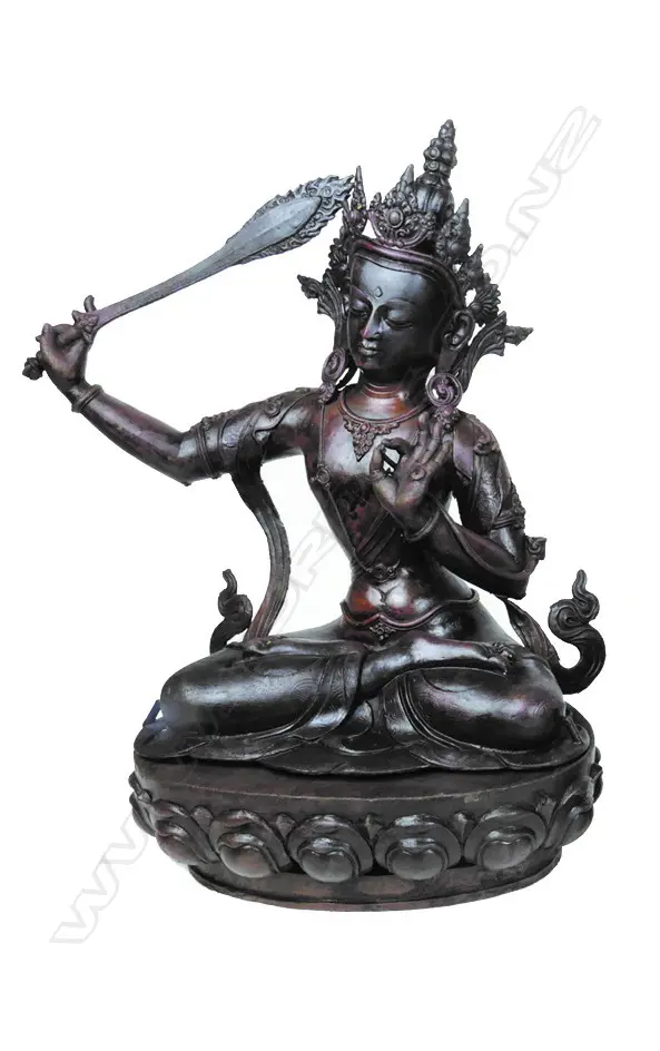 A Tibetan statuette of the bodhisattva Manjushri Image 1++