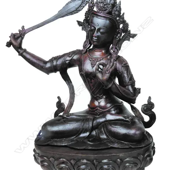 A Tibetan statuette of the bodhisattva Manjushri