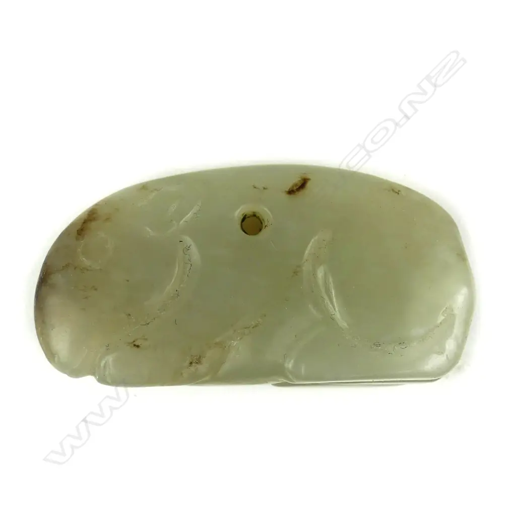 A Chinese pale green jade crouching rabbit pendant Image 1++