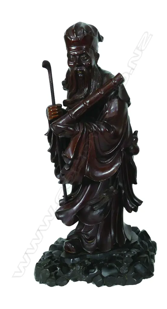 A Chinese carved rosewood figure of a scholar Image 1++