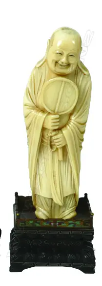 A 19thC Chinese finely carved ivory figure of a sage Image 1++