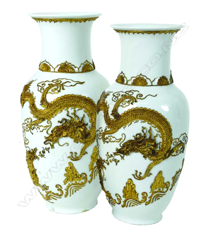A pair of Chinese white baluster porcelain vases Image 1++