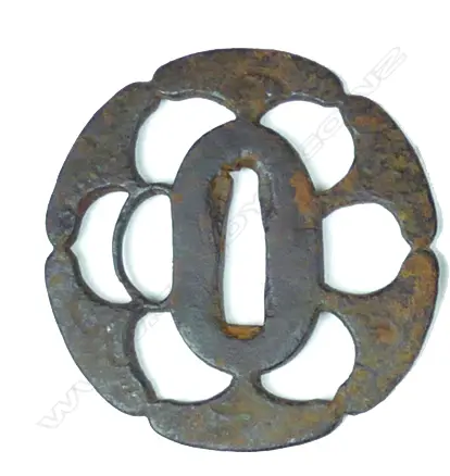 A late Edo iron tsuba Image 1++