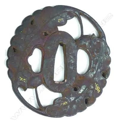 A late Edo iron tsuba Image 1++