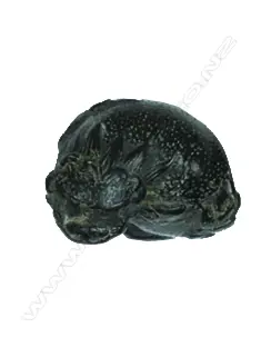 A small compact carved wood netsuke Image 1++