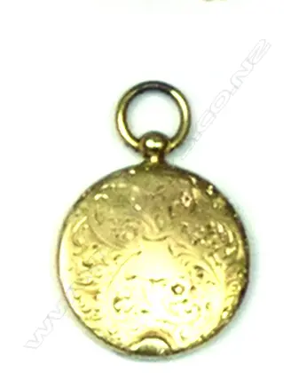A 12ct gold locket Image 1++