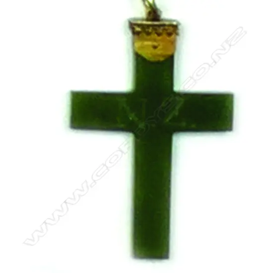 A colonial 9ct gold and greenstone cross
