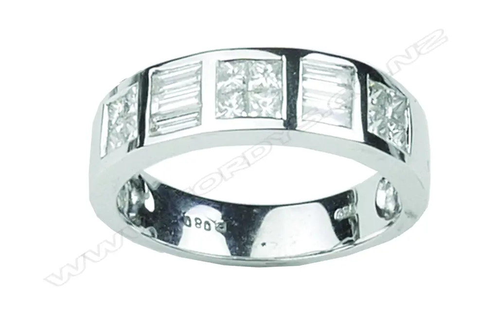 An 18ct. white gold eternity band type ring Image 1++