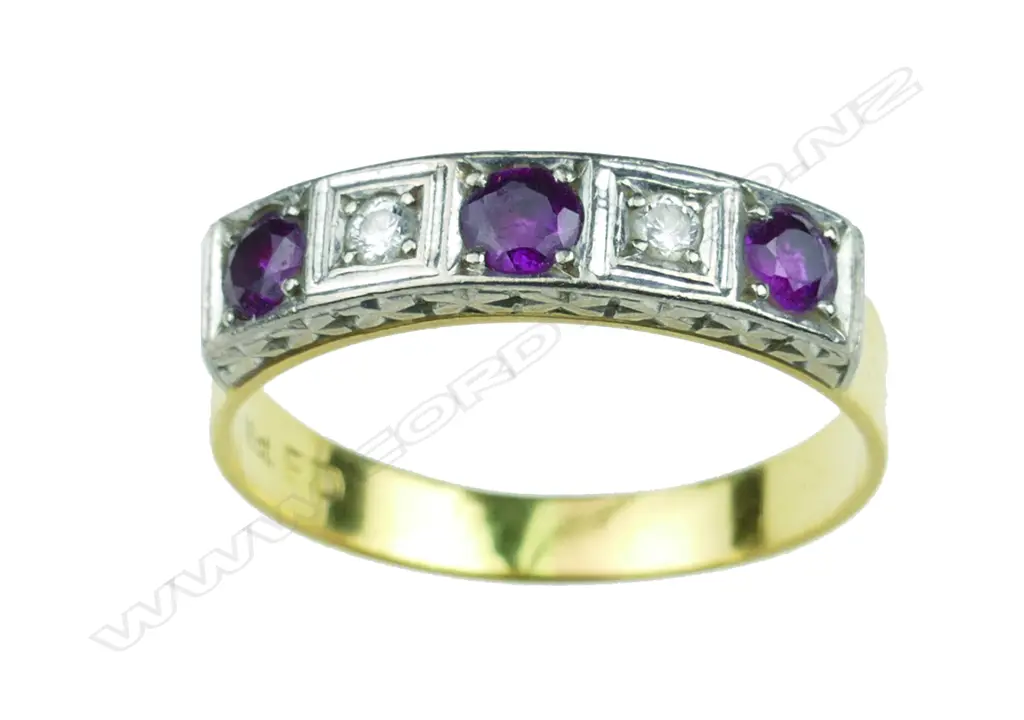 A lady's estate 18ct. yellow gold ruby and diamond ring Image 1++