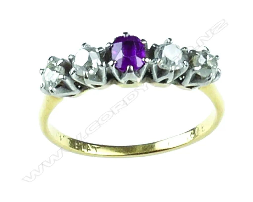 An estate lady's 18ct. yellow gold ruby and diamond ring Image 1++