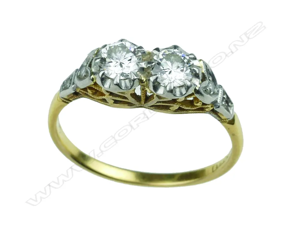 A lady's estate 18ct. yellow gold and two-diamond ring Image 1++