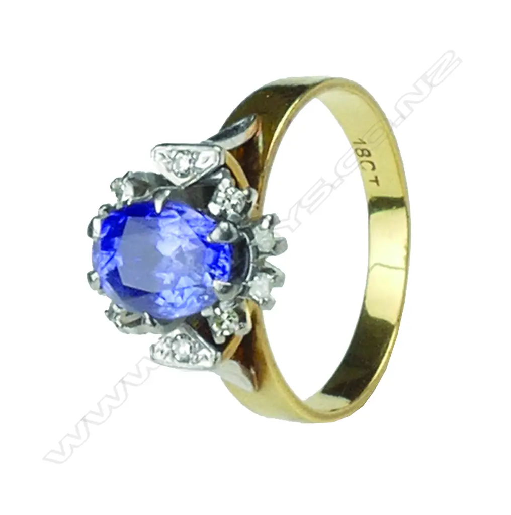 An 18ct gold sapphire and diamond ring Image 1++