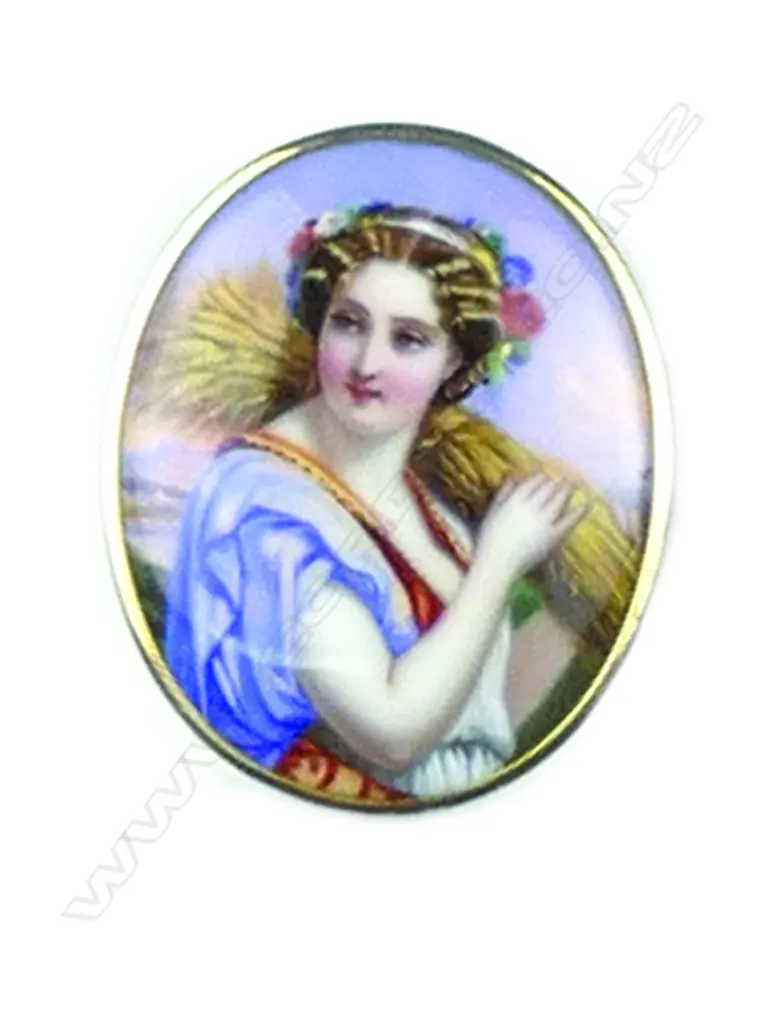 A gold framed 19thC Swiss enamelled portrait brooch Image 1++