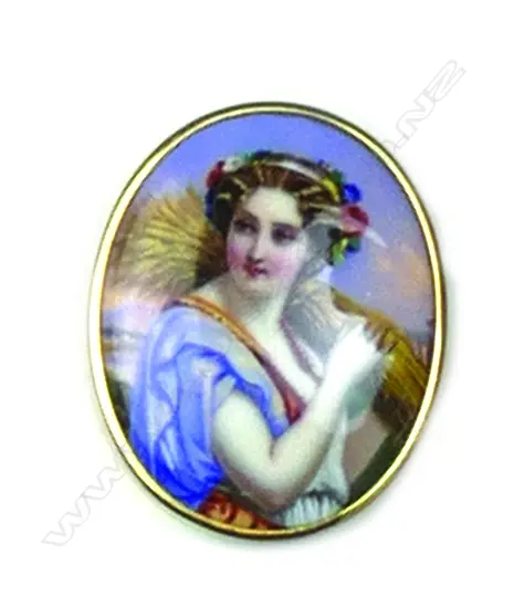 A gold framed 19thC Swiss enamelled portrait brooch Image 1++
