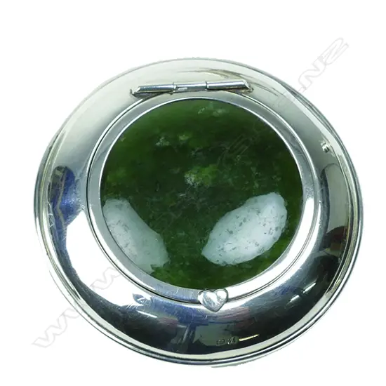 A silver and greenstone small squat circular box