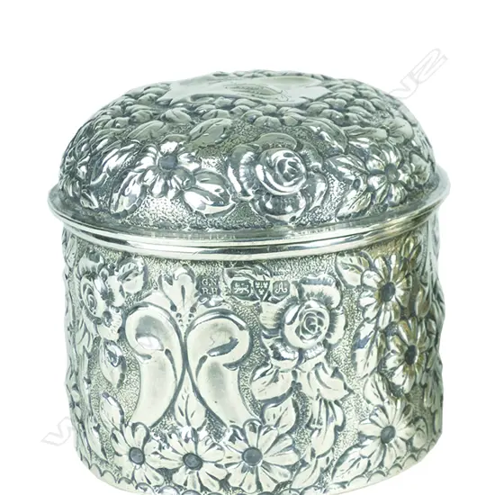 An Edwardian embossed silver lidded vanity container