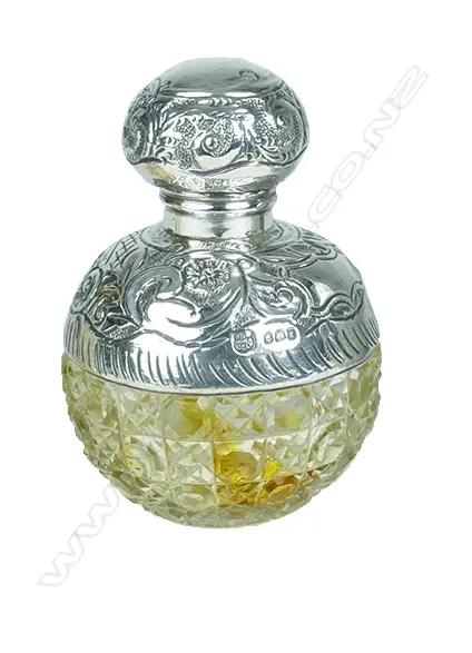 An Edwardian silver and cut crystal spherical scent bottle Image 1++