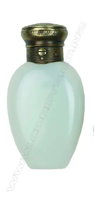 A Victorian silver gilt and milk glass perfume bottle Image 1++