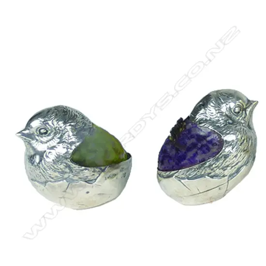 A pair of Edwardian silver chick pin cushions