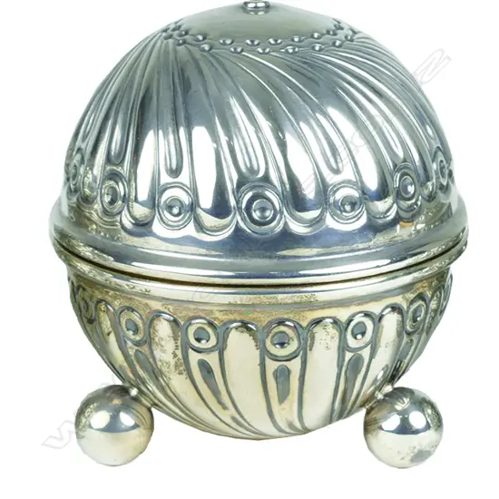 A late Victorian period embossed silver string holder